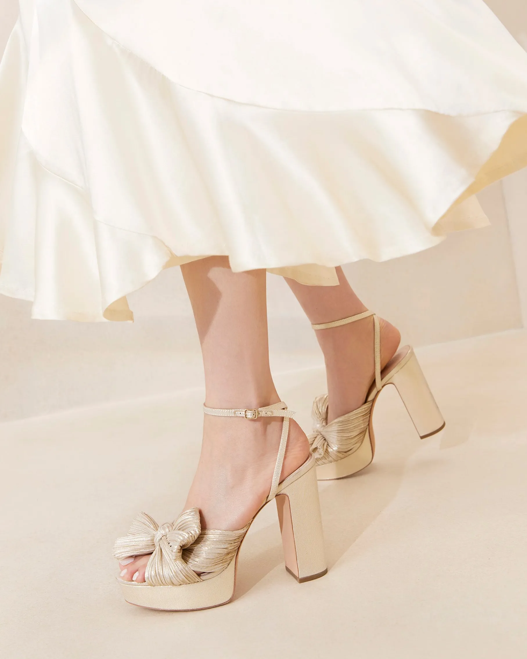 Natalia Platinum Platform Bow Heel