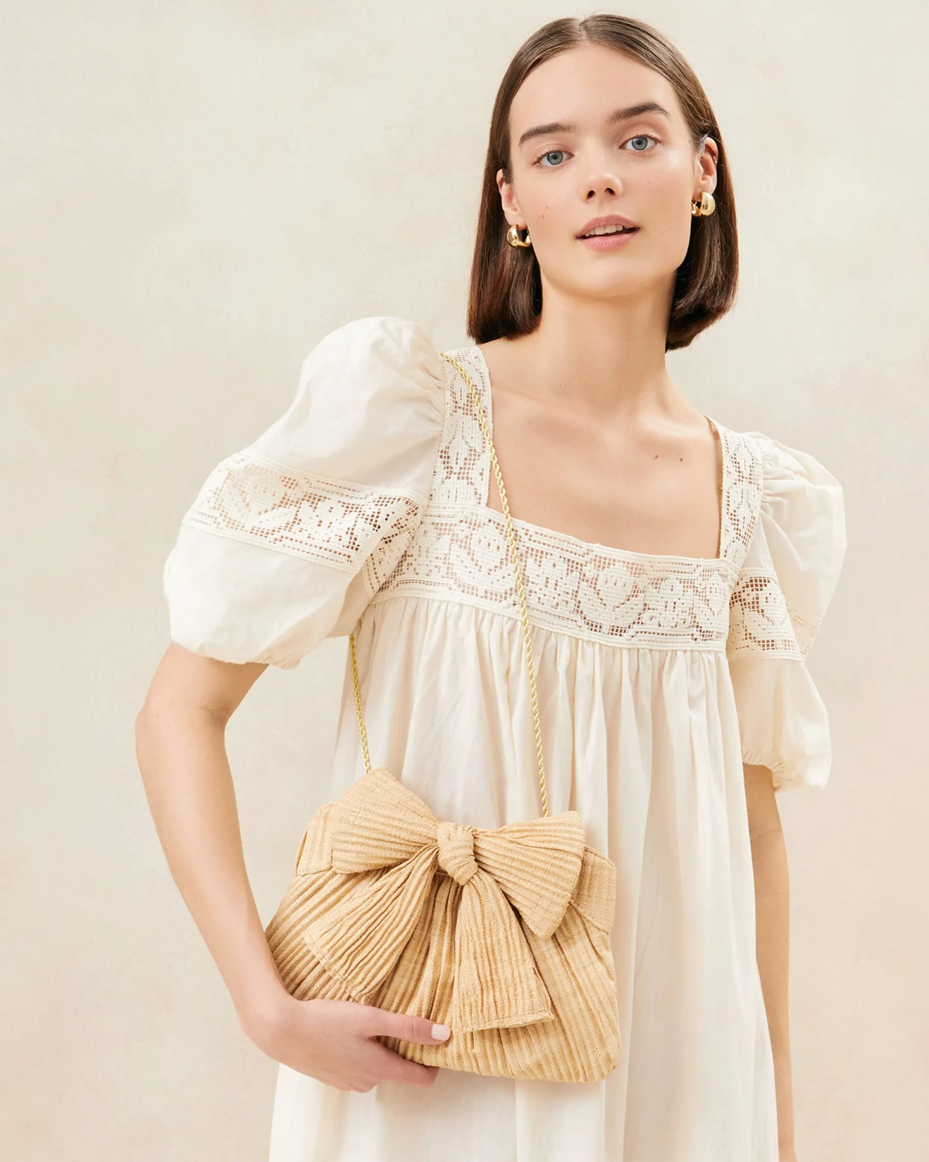 Rayne Platinum Bow Clutch
